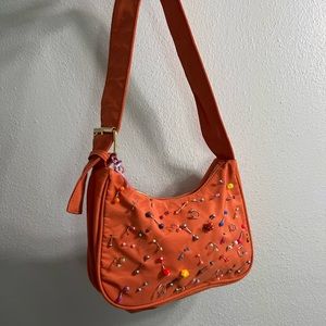 Pierced Shoulder Bag